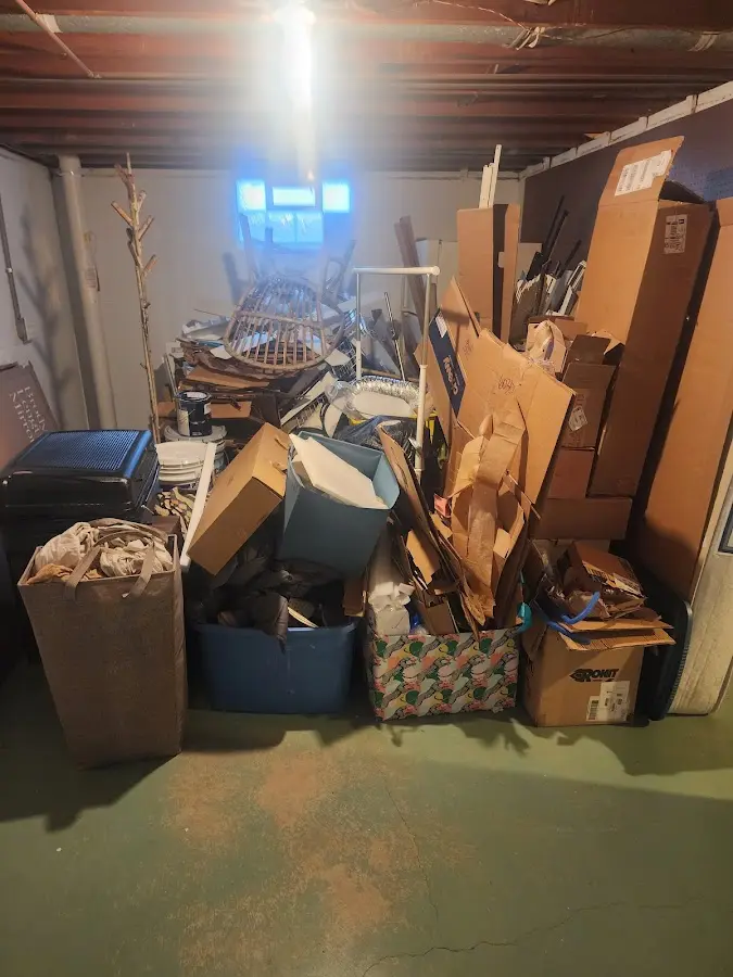 Roll-off dumpster container at job site for 2 Yard Dumpster Rental in Ligonier